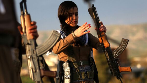 Nữ dân quân người Kurd trước thềm Năm mới của vùng Ba Tư - Sputnik Việt Nam