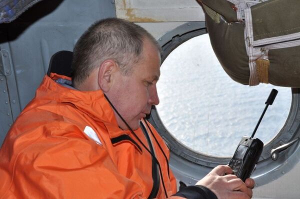 Hoạt động  tìm kiếm và cứu hộ tại biển Okhotsk để tìm tàu đánh cá Viễn Đông. - Sputnik Việt Nam