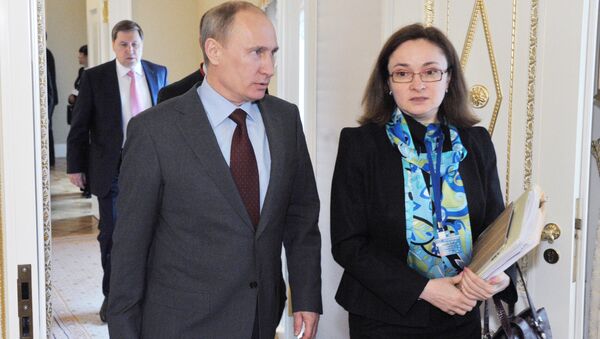 Tổng thống Nga Vladimir Putin và Thống đốc Ngân hàng Trung ương Nga  Elvira Nabiullina - Sputnik Việt Nam
