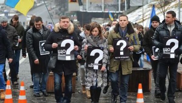 Những người tham gia biểu tình kỷ niệm các sự kiện trên Quảng trường Độc lập ở Kiev - Sputnik Việt Nam