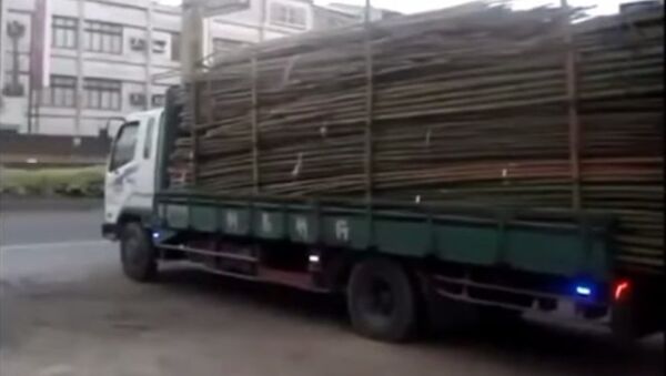 Người Trung Quốc làm thế nào để bốc dỡ xe tải - Sputnik Việt Nam