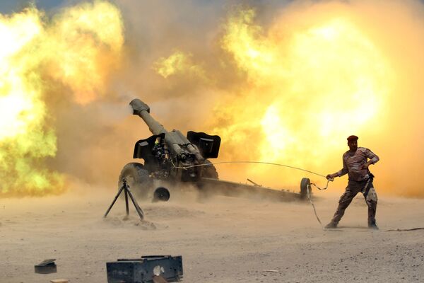 Thành viên lực lượng an ninh Iraq trong cuộc đụng độ với chiến binh Daesh ở Fallujah, Iraq - Sputnik Việt Nam