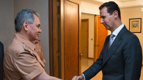 Bộ trưởng Quốc phòng Nga Sergei Shoigu và Tổng thống Syria Bashar al-Assad - Sputnik Việt Nam