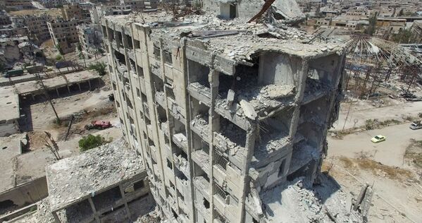 Tòa nhà bị phá hủy ở Bani Zeid, phía bắc Aleppo - Sputnik Việt Nam