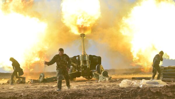 28 tháng 12. Iraq. Khu vực Mosul. Lực lượng pháo binh nhân dân giáng đòn vào chiến binh IS. - Sputnik Việt Nam