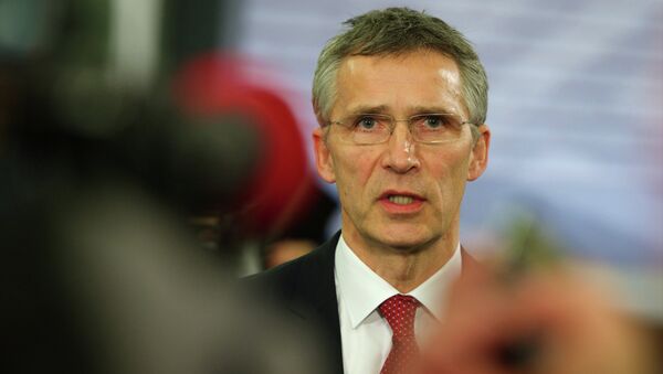 NATO Secretary General Jens Stoltenberg speaks with journalists prior to an Informal Meeting of EU Defence Ministers in Riga, Latvia on January 18, 2015 - Sputnik Việt Nam