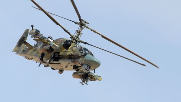 Вертолет Ка-52 Аллигатор во время боевой операции в окрестностях освобожденного от боевиков города Эль-Карьятейн - Sputnik Việt Nam