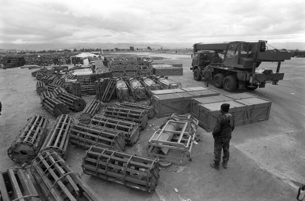 Bãi chứa đạn dược tại căn cứ không quân Hmeymim ở Syria - Sputnik Việt Nam