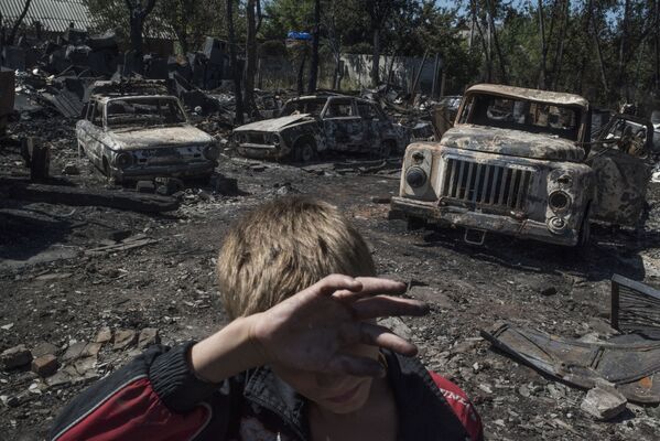 Hậu quả cuộc pháo kích vào làng Lozovoe trong tỉnh Donetsk - Sputnik Việt Nam