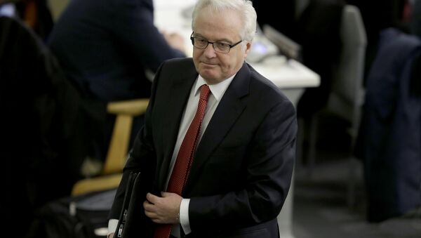 Russian ambassador to the United Nations Vitaly Churkin leaves the General assembly hall after a vote supporting the territorial integrity of Ukraine at United Nations headquarters, Thursday, March 27, 2014 - Sputnik Việt Nam