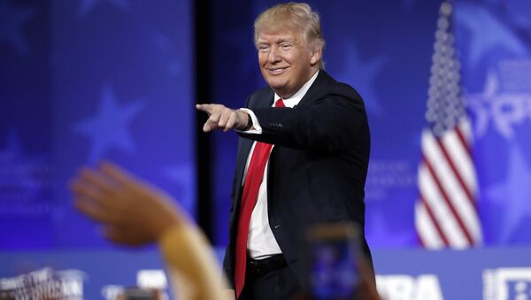 President Donald Trump points to a supporter after speaking at the Conservative Political Action Conference (CPAC), Friday, Feb. 24, 2017, in Oxon Hill, Md. - Sputnik Việt Nam