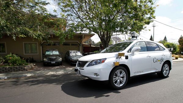 Google's self-driving Lexus car drives along street during a demonstration at Google campus on Wednesday, May 13, 2015, in Mountain View, Calif - Sputnik Việt Nam