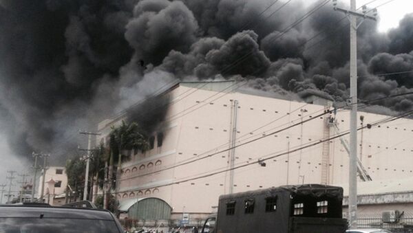 Đám cháy bùng phát vào ngày 23-3 tại công ty may. - Sputnik Việt Nam