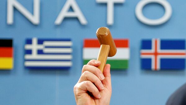 NATO Secretary-General Jens Stoltenberg holds up a ceremonial hammer at the start of a NATO-Georgia defence ministers meeting at the Alliance headquarters in Brussels, Belgium February 16, 2017. - Sputnik Việt Nam