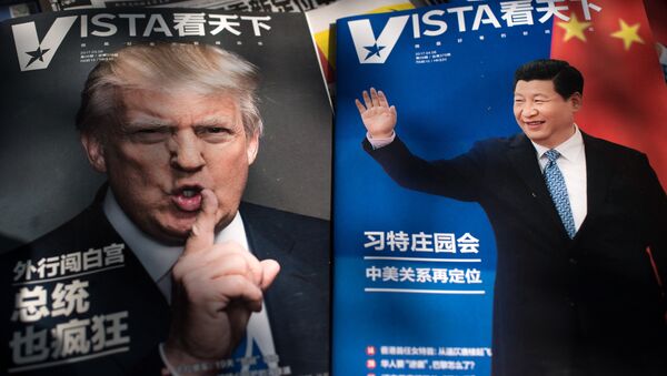 Magazines featuring front pages of US President Donald Trump (L) and China's President Xi Jinping (R) are displayed at a news stand in Beijing - Sputnik Việt Nam