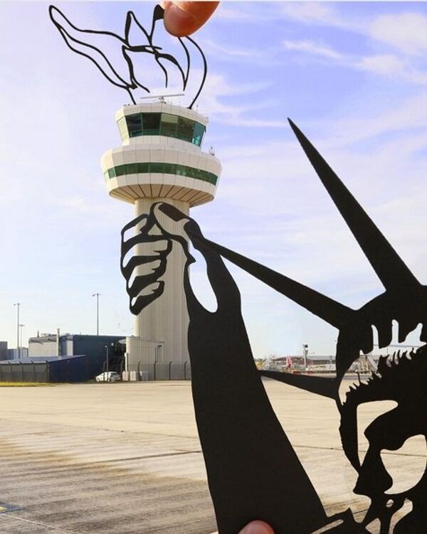 ... Theo nhiếp ảnh gia, tháp điều khiển của sân bay Gatwick London ... rất giống ngọn đuốc của tượng Nữ thần Tự do. - Sputnik Việt Nam
