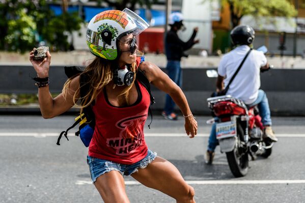 Ngày Lao động Quốc tế 1 tháng Năm  ở Venezuela. Các thành viên tham gia biểu tình chống Chính phủ tại thủ đô Caracas. - Sputnik Việt Nam