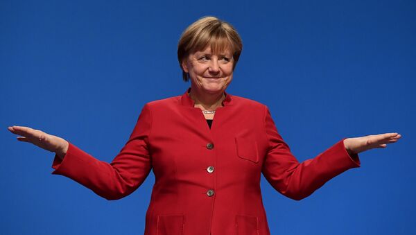 German Chancellor Angela Merkel gestures after addressing delegates during her conservative Christian Democratic Union (CDU) party's congress in Essen, western Germany, on December 6, 2016. - Sputnik Việt Nam