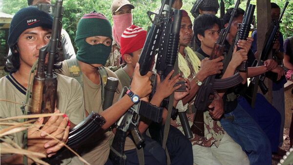 Боевики из филиппинской воинственной террористической исламистской группы Абу Сайяф. Архивное фото - Sputnik Việt Nam