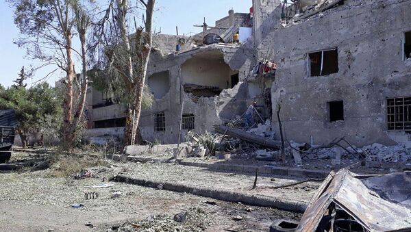 Разрушенное здание в результате взрыва в Дамаске - Sputnik Việt Nam