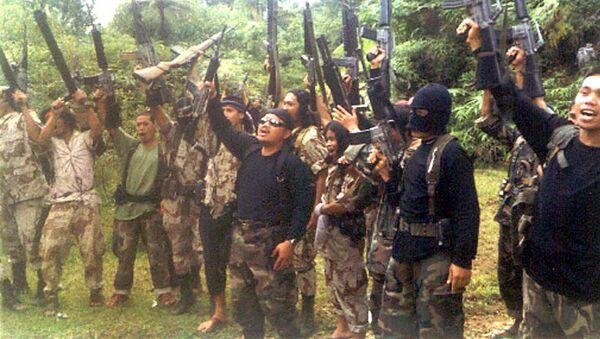 Боевики филиппинской воинственной террористической исламистской группы Абу Сайяф. Архивное фото - Sputnik Việt Nam