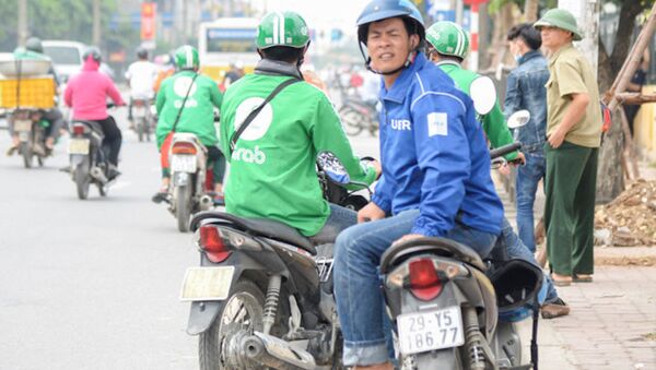 Hà Nội là địa phương nằm trong đề án thí điểm của Uber, Grab. - Sputnik Việt Nam