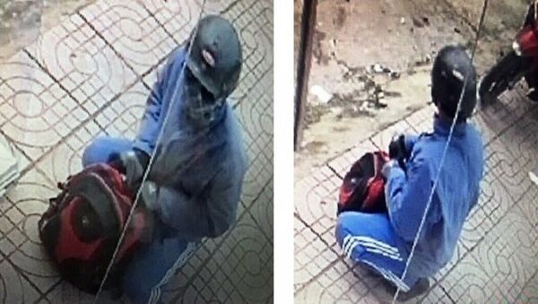 Hình ảnh kẻ cướp được camera ghi lại được - Sputnik Việt Nam