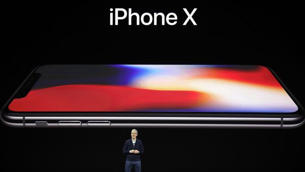 Apple CEO Tim Cook announces the new iPhone X at the Steve Jobs Theater on the new Apple campus, Tuesday, Sept. 12, 2017, in Cupertino, California. - Sputnik Việt Nam