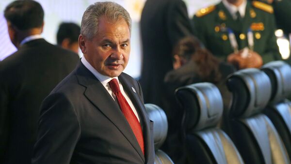Russian Defense Minister Gen. Sergei Shoigu prepares to take his seat for the two-day ASEAN Defense Ministers' Meeting and its Dialogue Partners Tuesday, Oct. 24, 2017 at Clark, Pampanga province, north of Manila, Philippine - Sputnik Việt Nam