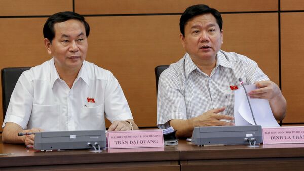 Chủ tịch nước Trần Đại Quang  và Đinh La Thăng - Sputnik Việt Nam