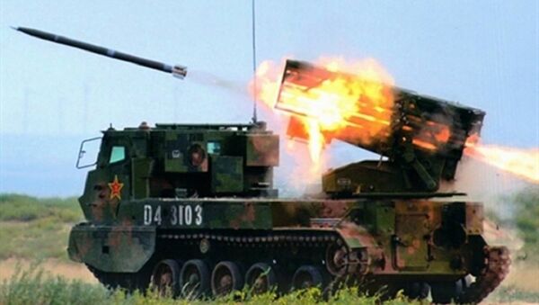 Giàn phóng pháo phản lực được tích hợp trên khung xe thiết giáp bánh xích - Sputnik Việt Nam