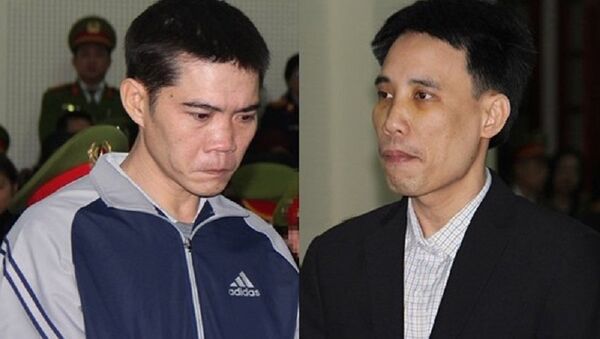 Bị cáo Hoàng Đức Bình (phải) và Nguyễn Nam Phong trước tòa. - Sputnik Việt Nam
