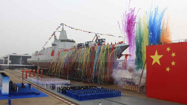 In this photo released by Xinhua News Agency, fireworks explode next to China's new domestically-built 10,000-ton Type 055 destroyer during a launching ceremony at Jiangnan Shipyard in Shanghai, China, Wednesday, June 28, 2017 - Sputnik Việt Nam