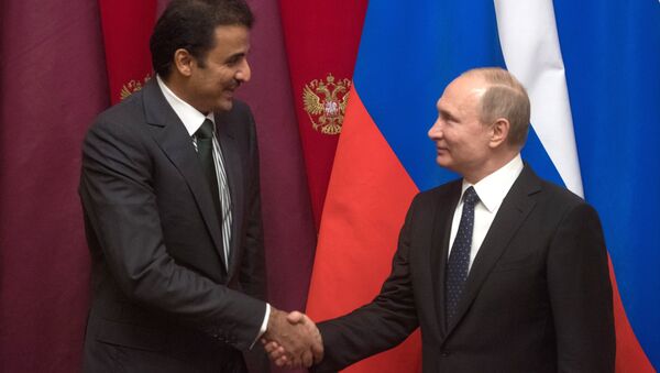 Tổng thống Vladimir Putin với Quốc vương Qatar Sheikh Tamim bin Hamad al-Thani. - Sputnik Việt Nam