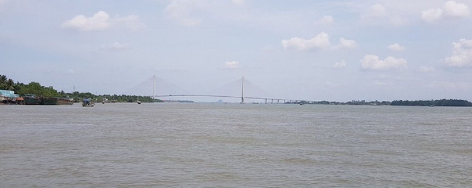 Đoạn sông Hậu, theo lộ trình của đò ngang từ Cần Thơ qua Vĩnh Long - Sputnik Việt Nam, 1920, 25.01.2024