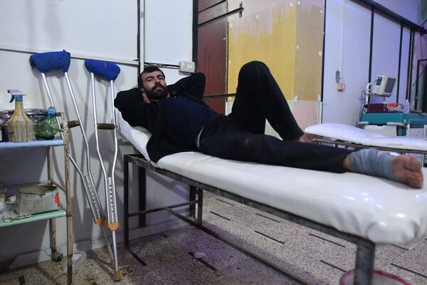 Bệnh nhân của bệnh viện ngầm thành phố Douma ở ngoại ô Damascus - Sputnik Việt Nam