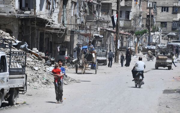 Douma, vùng ngoại ô Damascus, sau khi được giải phóng khỏi chiến binh - Sputnik Việt Nam