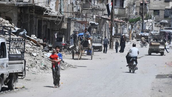 Douma, vùng ngoại ô Damascus, sau khi được giải phóng khỏi chiến binh - Sputnik Việt Nam