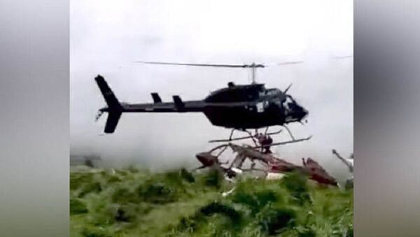 Sốc: Cánh quạt của chiếc trực tăng cắt đứt người kỹ sư trong khi hạ cánh (Video) - Sputnik Việt Nam
