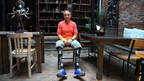 Vận động viên leo núi 70 tuổi bị cụt cả hai chân người Trung Quốc Xia Boyu - Sputnik Việt Nam