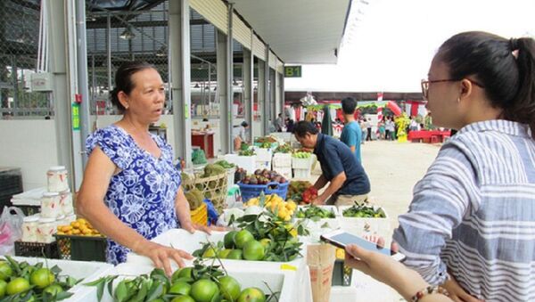Buôn bán tại chợ đầu mối nông sản Dầu Giây - Sputnik Việt Nam