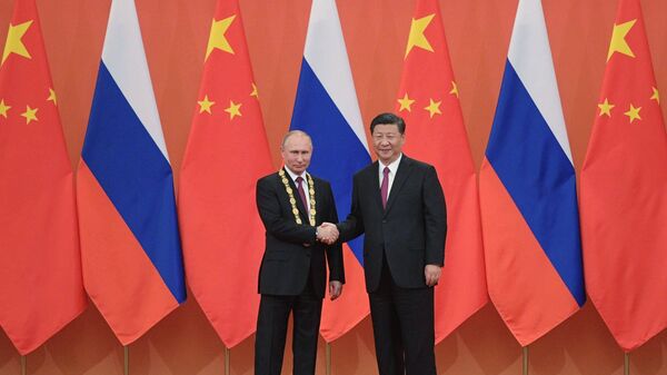 Tổng thống Nga Vladimir Putin và Chủ tịch Trung Quốc Tập Cận Bình  - Sputnik Việt Nam
