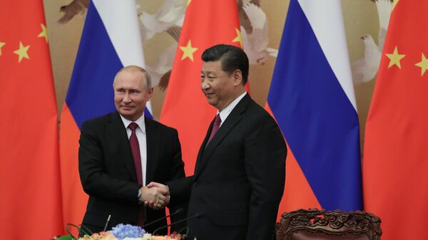 Tổng thống Nga Vladimir Putin và Chủ tịch Trung quốc Tập Cận Bình - Sputnik Việt Nam