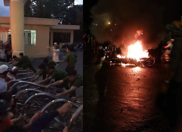 Những người quá khích xông vào cổng Ủy ban tỉnh và đốt xe máy. Những người quá khích xông vào cổng Ủy ban tỉnh và đốt xe máy. - Sputnik Việt Nam