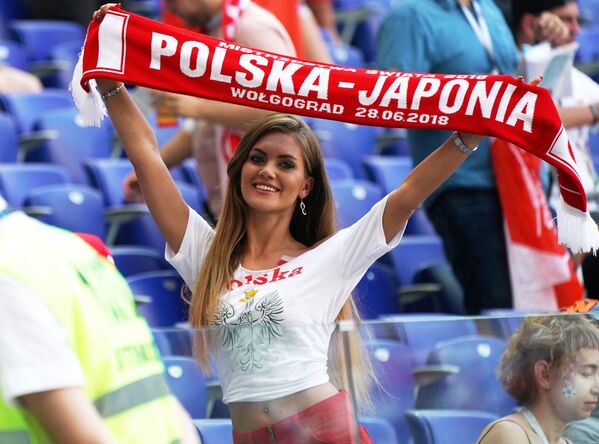 Nữ cổ động viên trước trận đấu vòng bảng của World Cup 2018 giữa hai đội Nhật và Ba Lan. - Sputnik Việt Nam