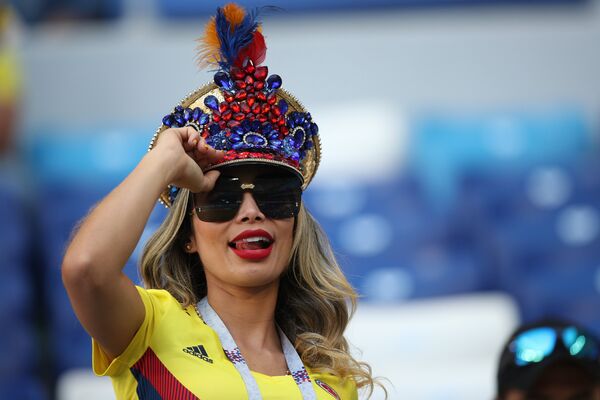 Nữ cổ động viên cho đội tuyển Colombia trước trận đấu vòng bảng của World Cup 2018 giữa hai đội Senegal và Colombia. - Sputnik Việt Nam
