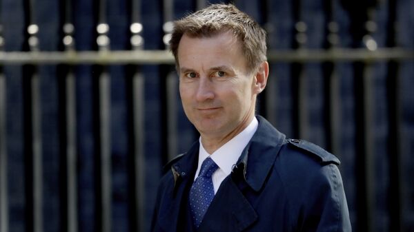 Britain's Health Secretary Jeremy Hunt arrives for a cabinet meeting at 10 Downing Street in London, Tuesday, May 1, 2018.  - Sputnik Việt Nam