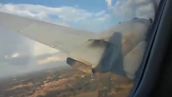 Ở Nam Phi, hành khách trên máy bay đang rơi  quay video khoảnh khắc rơi xuống - Sputnik Việt Nam