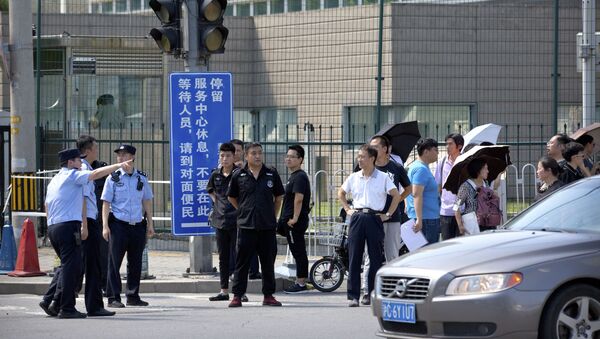 Một số nhân chứng thông báo về vụ nổ xảy ra gần Đại sứ quán Mỹ ở Bắc Kinh. - Sputnik Việt Nam