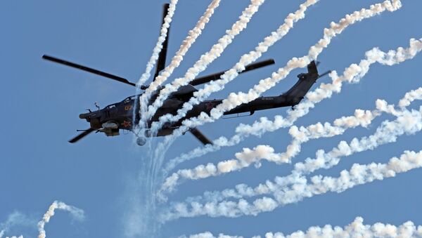 Trực thăng tấn công Mi-28H “Thợ săn đêm” trong khi trình diễn trong khuôn khổ diễn đàn kỹ thuật quân sự quốc tế lần thứ Tư “Quân đội-2018”  - Sputnik Việt Nam